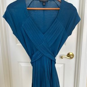 Dark blue wrap around top .